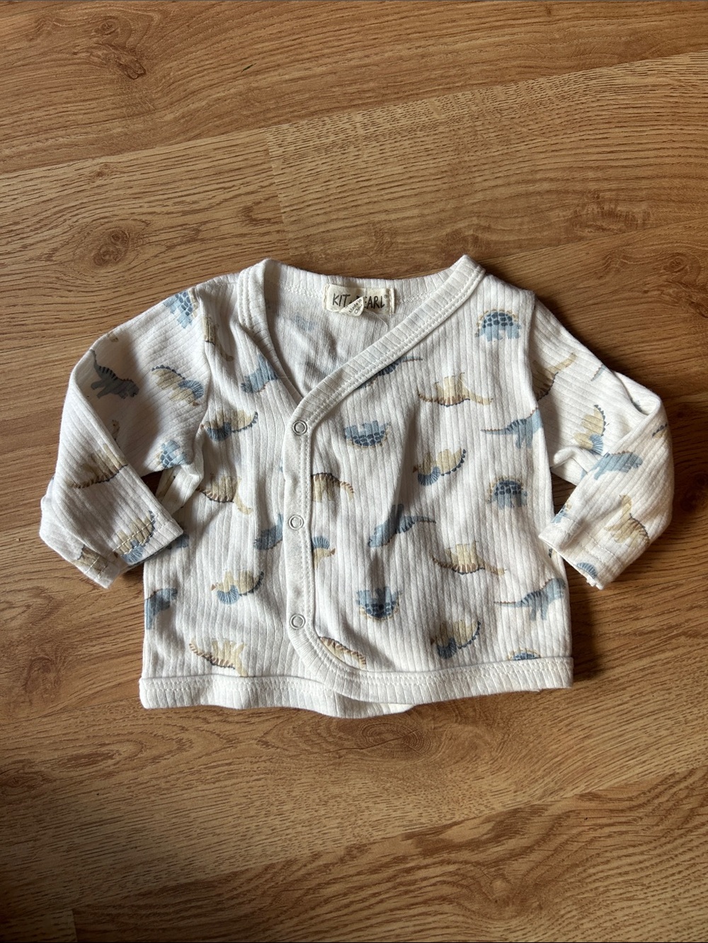 Cream Ribbed Wrap-Front Baby Top with Blue & Tan Dino Print